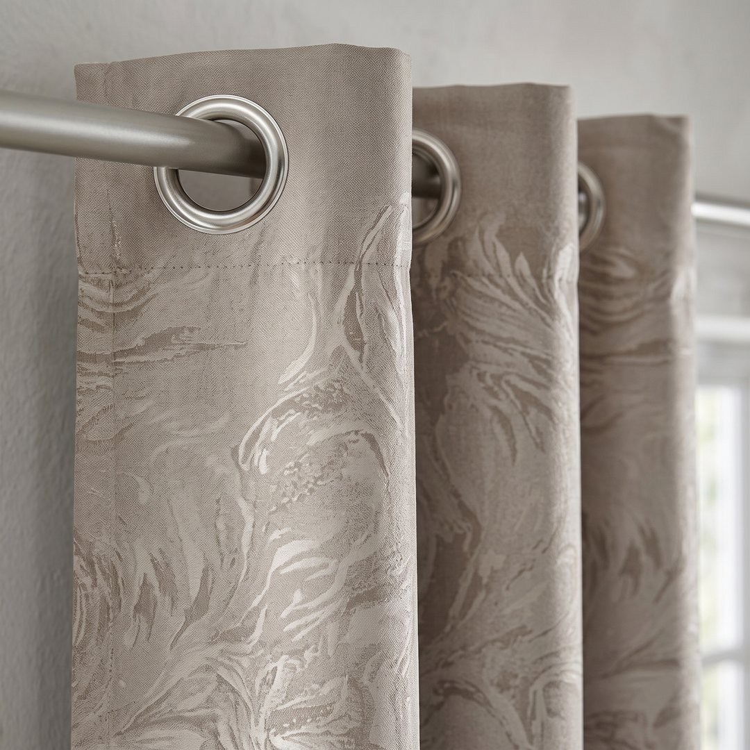Patterned Curtain Panel – Abstract Leaf in Taupe – close-up of silver eyelet rings on a metal pole