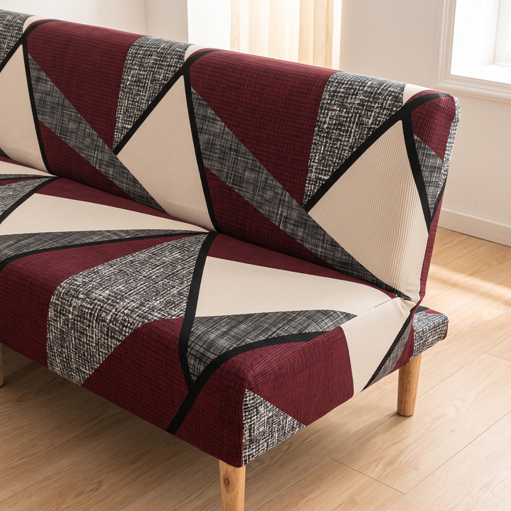 Stretch Futon Cover – Armless in Dark Burgundy – Geometric – tight corner crop of backrest, seat and pale legs