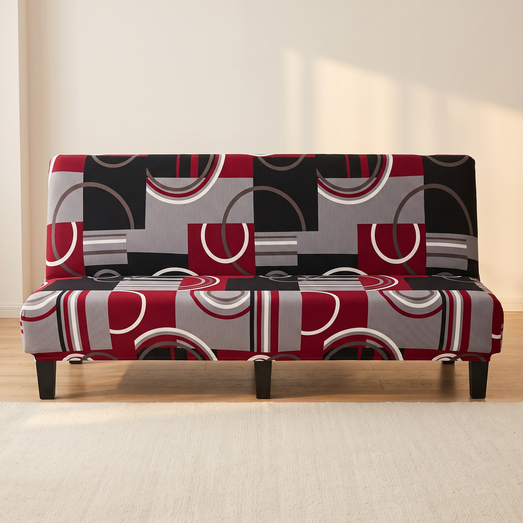 Stretch Futon Cover – Armless in Dark Red – Circle Block – front view with soft light across the wall and a flat beige rug