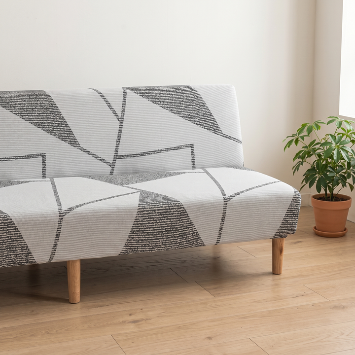 Stretch Futon Cover – Armless in Light Gray – Geometric – cropped side view of seat and backrest beside a terracotta potted plant