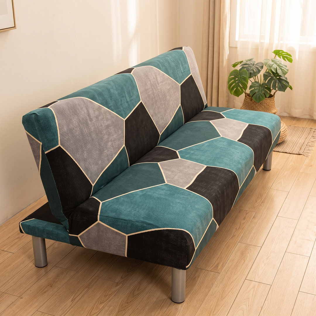 Stretch Futon Cover – Armless in Teal – Geometric – raised side angle showing silver metal legs and patchwork panels