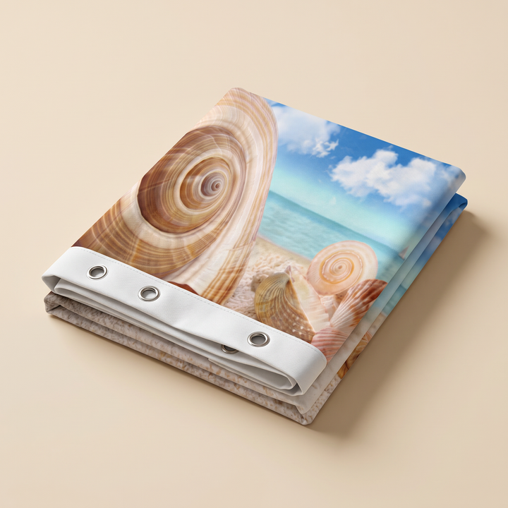 Beach Shower Curtain – Seaside Photo Prints in Sand – Seashells – folded neatly on a plain beige background, seen from above