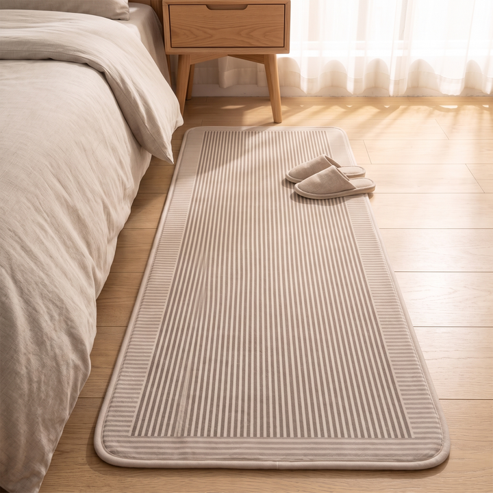 Bedroom Runner Rug in Taupe – Striped – with a pair of slippers on it, sheer curtains behind