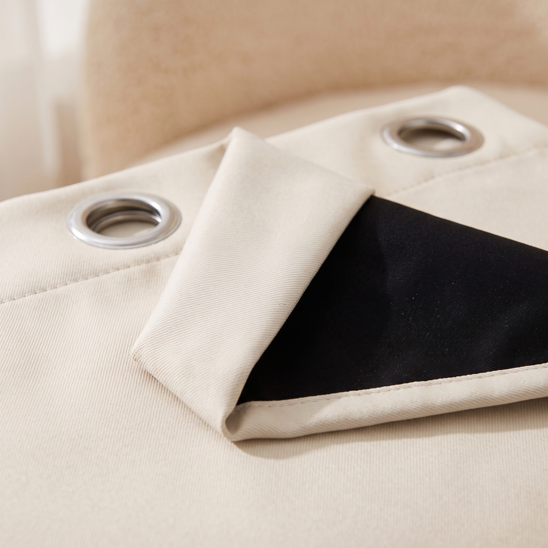 Close-up of the grommet top and the black light-blocking backing