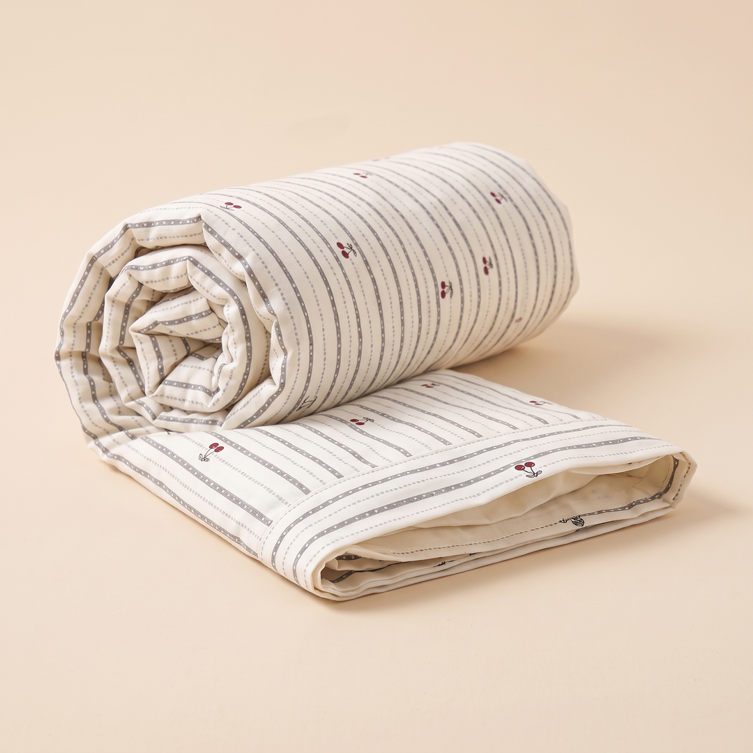 Body Pillowcase – Printed in Gray Cherry Stripe – loosely rolled into a spiral with the open edge showing