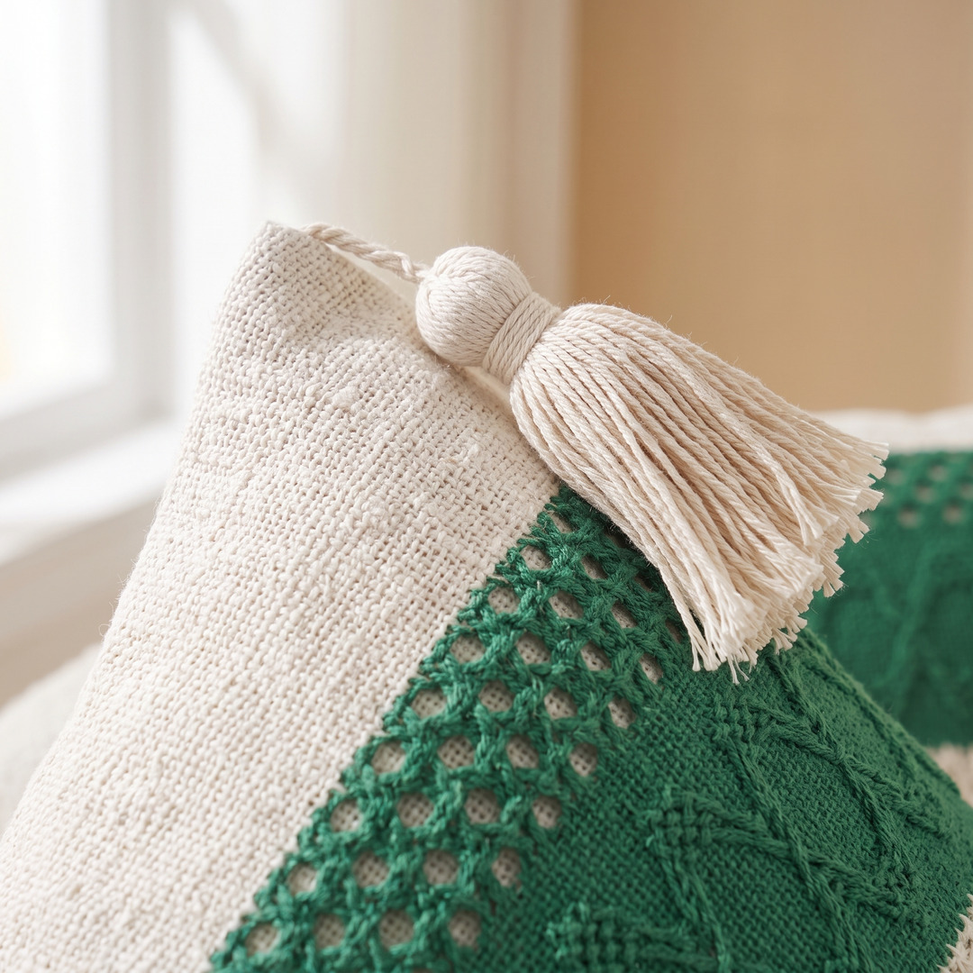 Boho Pillow Cover with Tassels – Woven in Cream – Green Stripe – close-up of the corner tassel and woven texture by a window