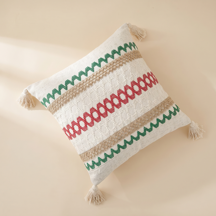 Boho Pillow Cover with Tassels – Woven in Cream – Green &amp; Red Zigzag – turned on its point in soft window light