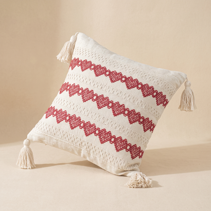 Boho Pillow Cover with Tassels – Woven in Cream – Red Zigzag – embroidered rows sloping down to the right, leaning on two bottom tassels