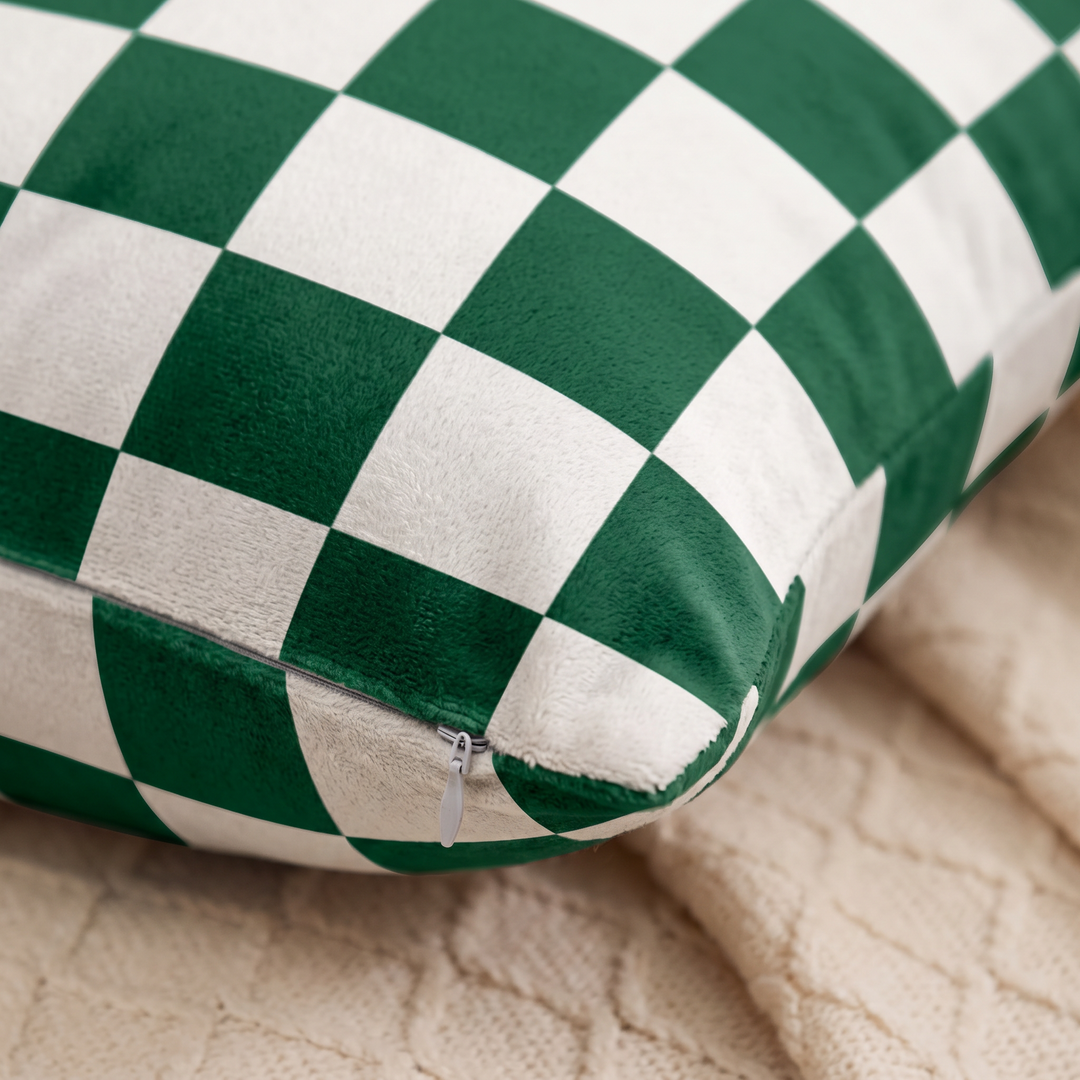Checkered Pillow Cover in Forest Green &amp; White Check – close-up of the corner and hidden zipper on a cream knit blanket