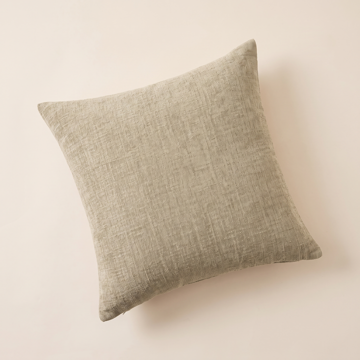 Chenille Throw Pillow Cover in Beige – flat lay from above on a plain cream background