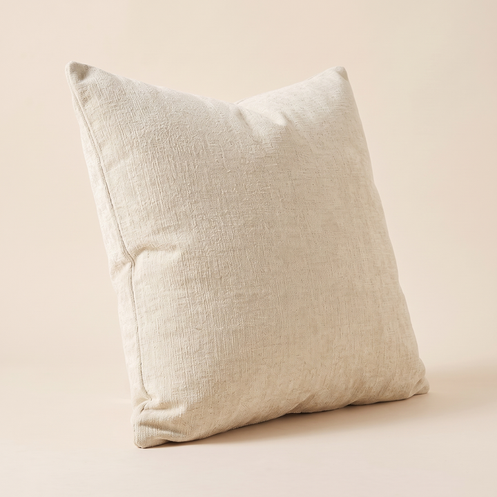 Chenille Throw Pillow Cover in Cream – angled three-quarter view showing the side seam and depth