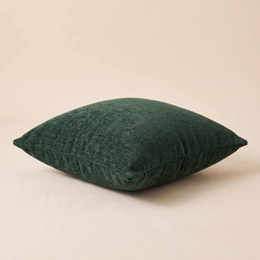 Chenille Throw Pillow Cover in Forest Green – resting flat, low side-on view of the piped edge