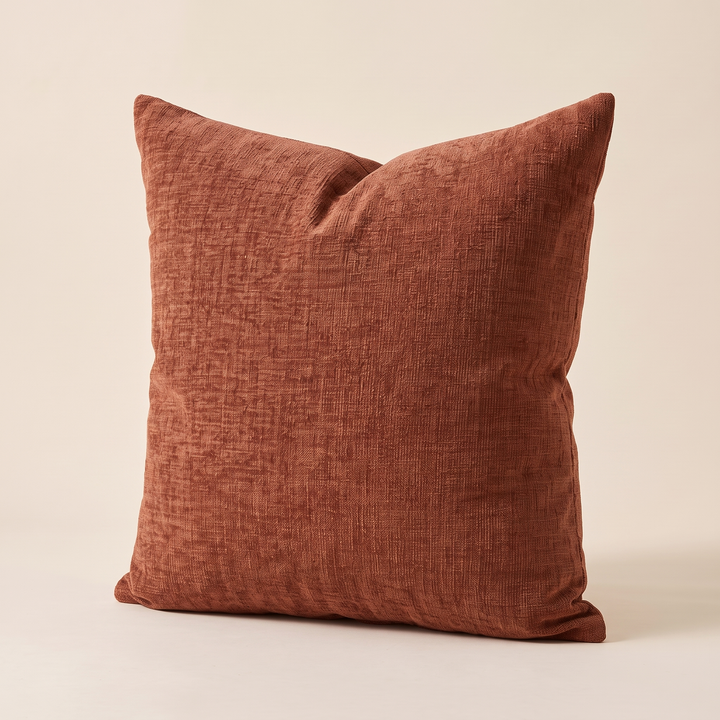 Chenille Throw Pillow Cover in Rust – turned slightly, casting a soft shadow to the right