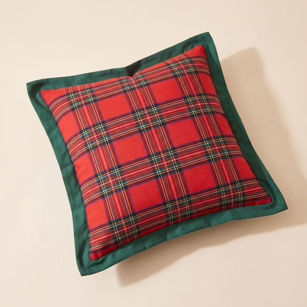 Christmas Plaid Pillow Cover in Red – Bordered Tartan – turned slightly off-axis with a long soft shadow to the right