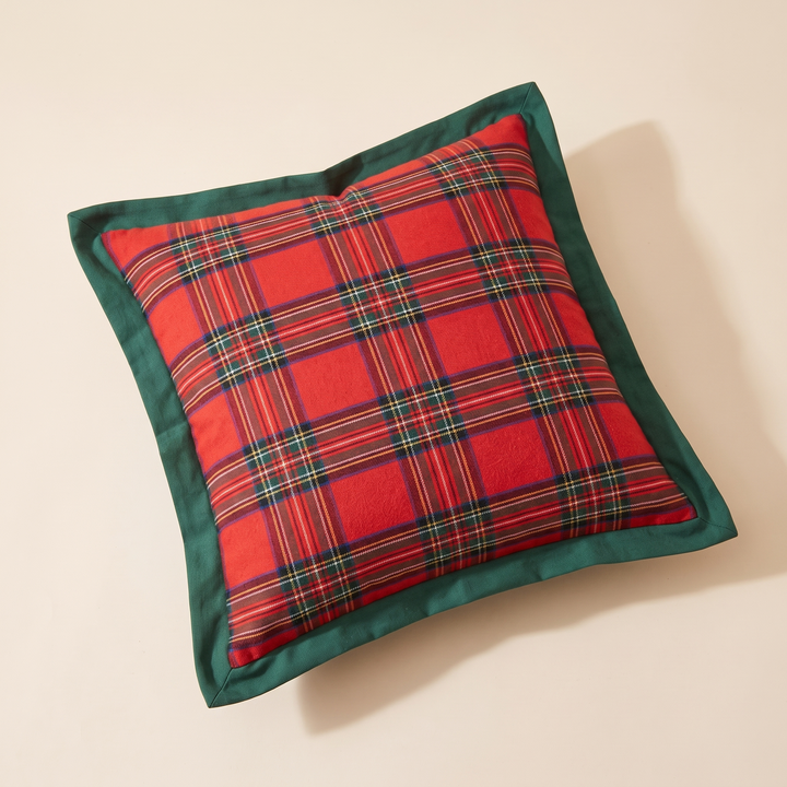 Christmas Plaid Pillow Cover in Red – Bordered Tartan – turned slightly off-axis with a long soft shadow to the right