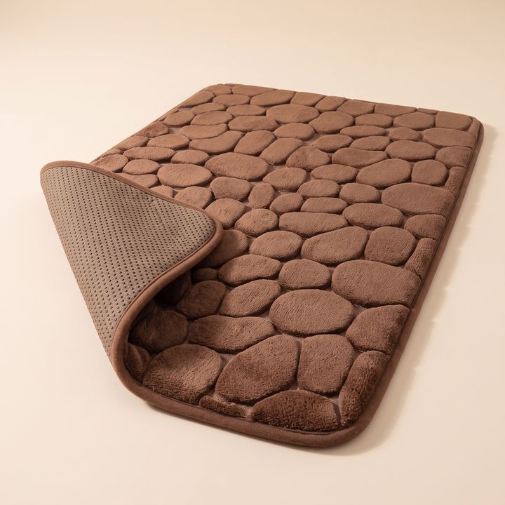 Non-Slip Memory Foam Bath Mat – Cobblestone in Brown – corner folded back to show the dotted non-slip underside