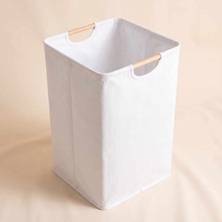 Collapsible Laundry Basket in White – high angle looking down into the empty open interior