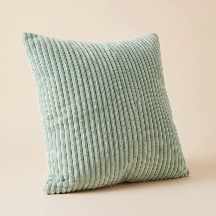 Corduroy Pillow Cover in Mint Green – three-quarter view from the left with vertical ribs