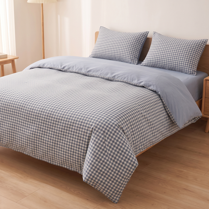 Cotton Duvet Cover Set in Blue Gingham – low side angle of bed with floor lamp and wooden side table