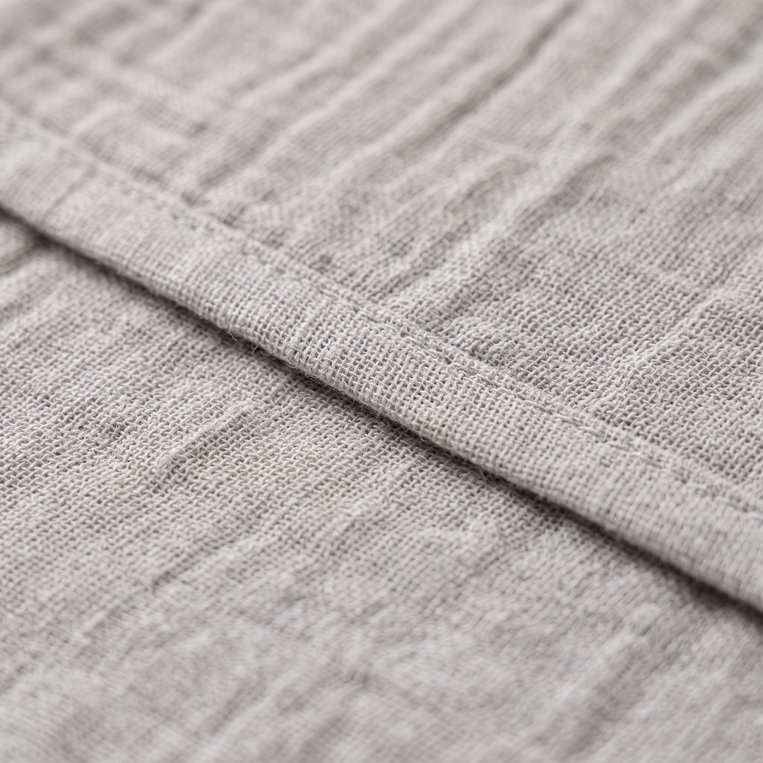 Cotton Gauze Napkins – Set of 6 in Gray – close-up of the hemmed edge and crinkled gauze texture