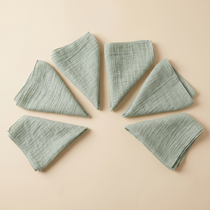 Cotton Gauze Napkins – Set of 6 in Sage – folded triangles arranged in a half-circle with points toward center