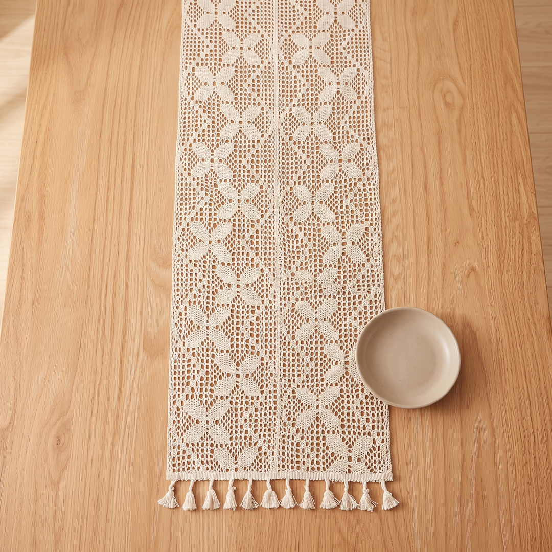 Crochet Table Runner in Ivory – Flower Grid – overhead view centered on wood table, tassels at bottom