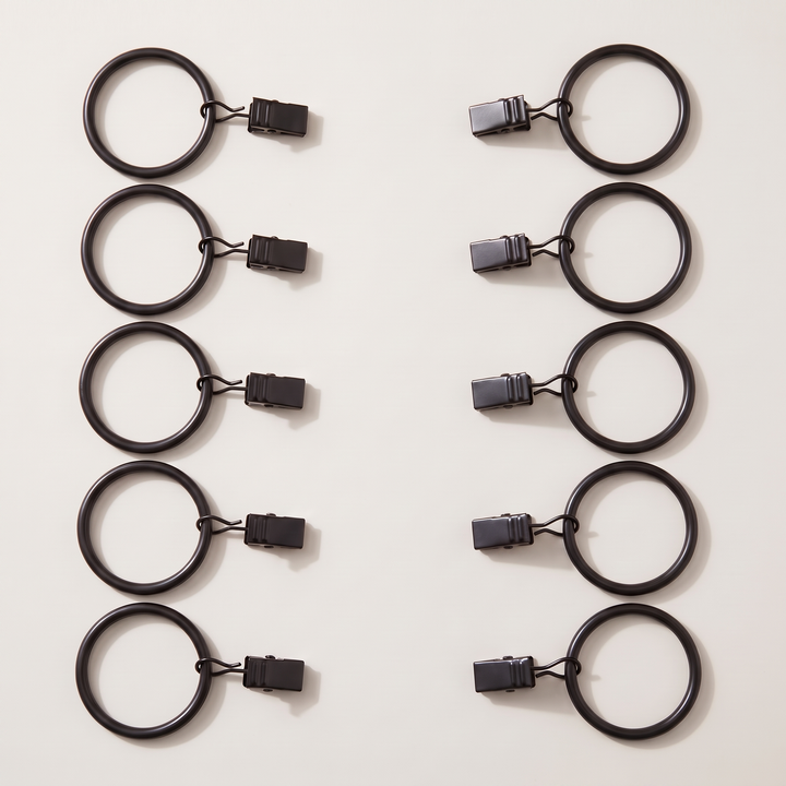 Metal Curtain Rings with Clips in Black – ten rings with clips arranged in two vertical rows on white