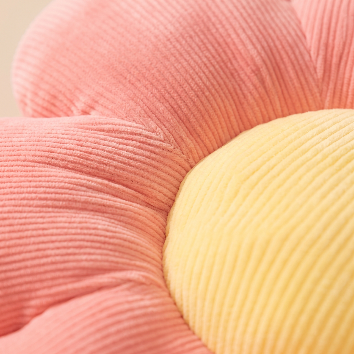 Daisy Flower Pillow in Coral – close-up of the ribbed corduroy texture and petal seams