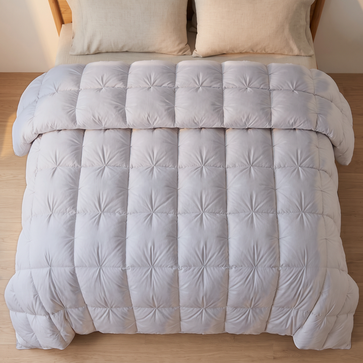 Down Comforter – White Goose Down, Puffy Pinch-Pleat in Light Gray – top-down view of pleated squares with top edge folded back