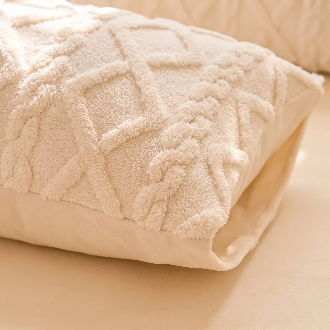 Embossed Velvet Pillowcases – Set of 2 in Beige – close-up of the tufted diamond pattern on a pillow corner