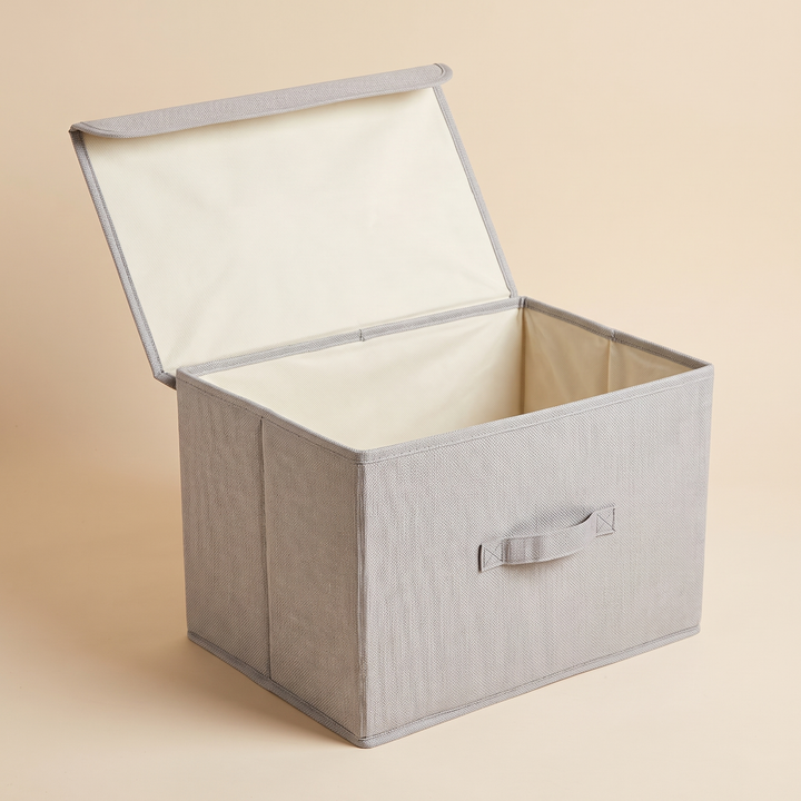 Fabric Storage Bin with Lid – Foldable in Gray – corner view with lid standing upright, showing bound rim edges