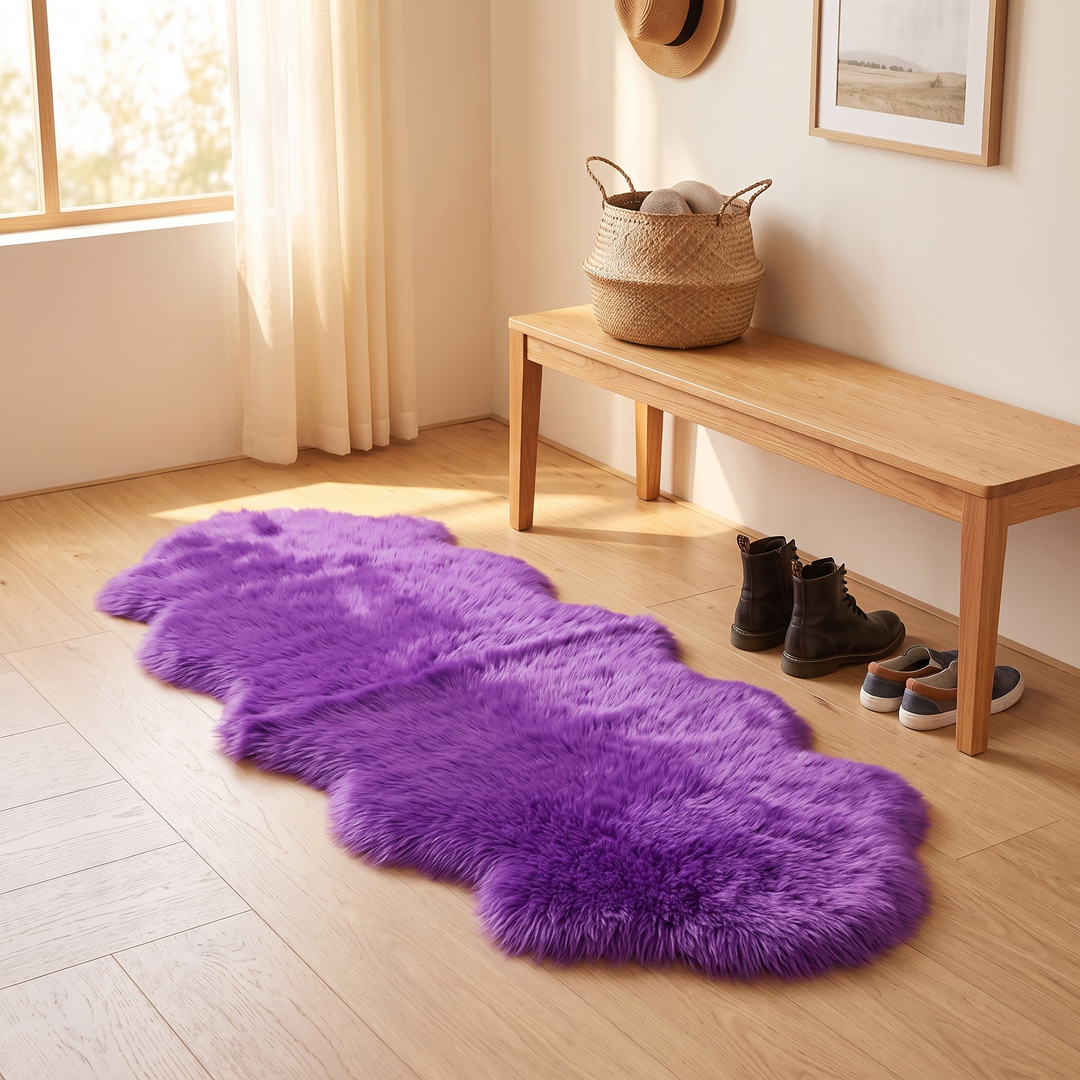 Shaggy Faux Sheepskin Rug in Violet – in an entryway in front of a wooden bench with boots and shoes