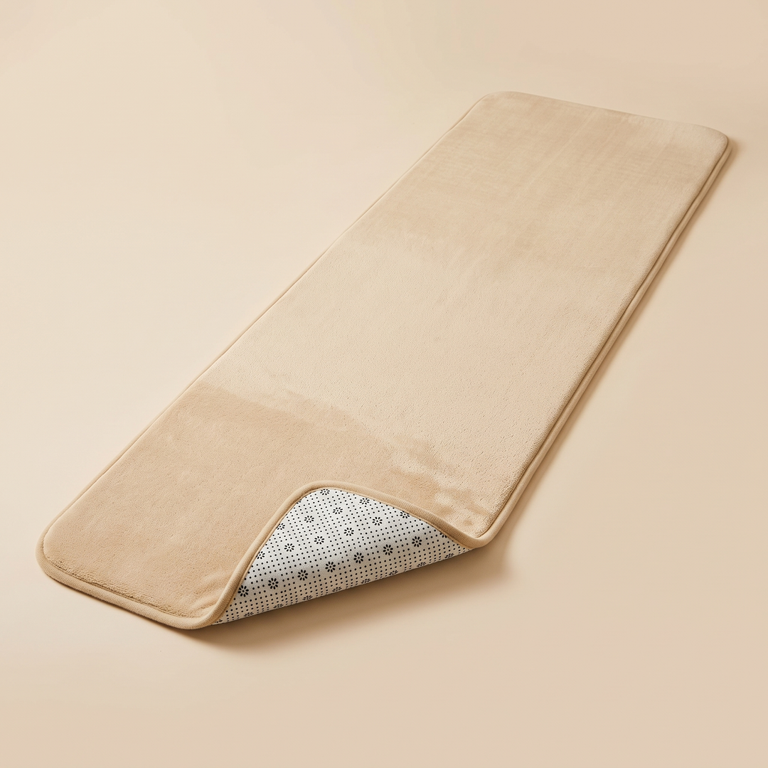 Flannel Kitchen Rug – Cushioned, Non-Slip in Beige – laid flat with one corner folded back showing dotted non-slip backing