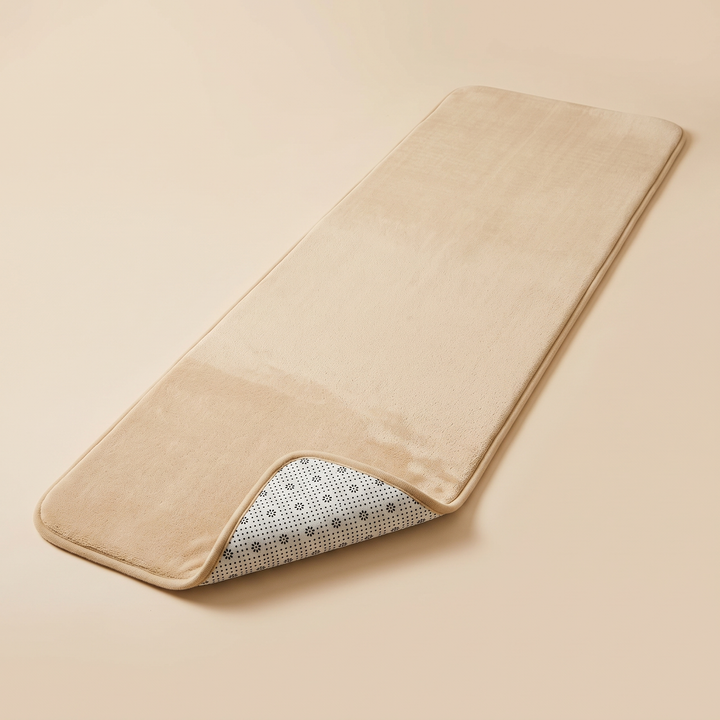 Flannel Kitchen Rug – Cushioned, Non-Slip in Beige – laid flat with one corner folded back showing dotted non-slip backing