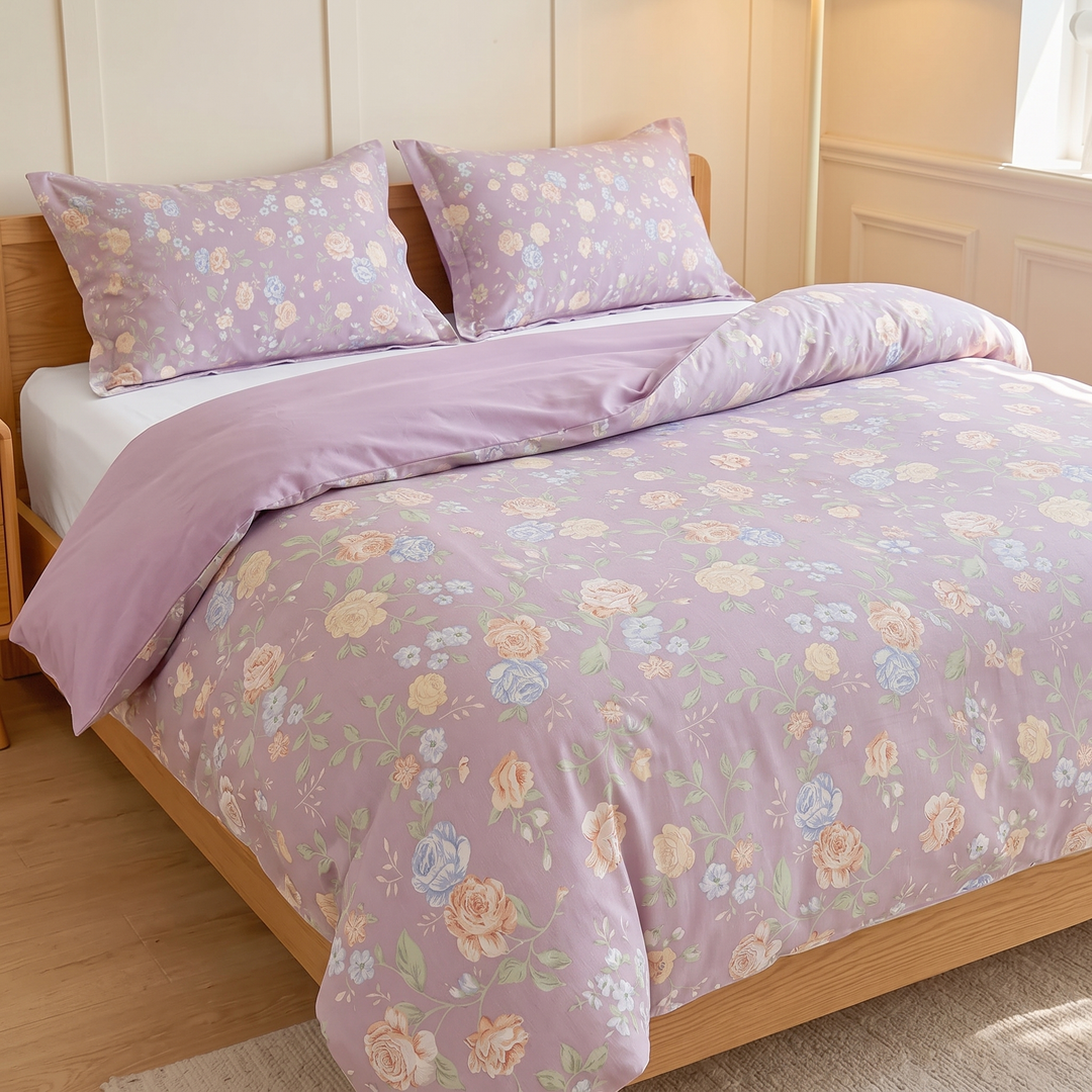 Floral Cotton Duvet Cover Set in Lavender Floral – three-quarter view against cream wall paneling and window