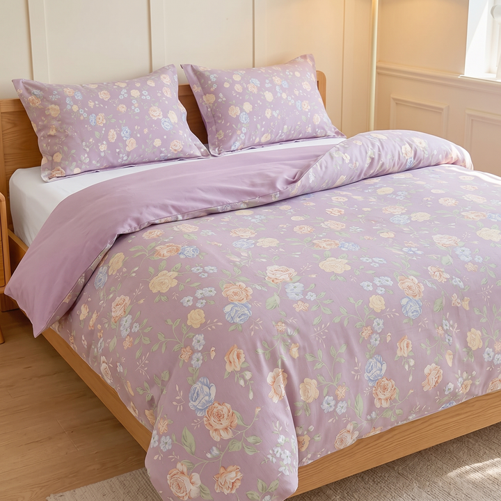 Floral Cotton Duvet Cover Set in Lavender Floral – three-quarter view against cream wall paneling and window