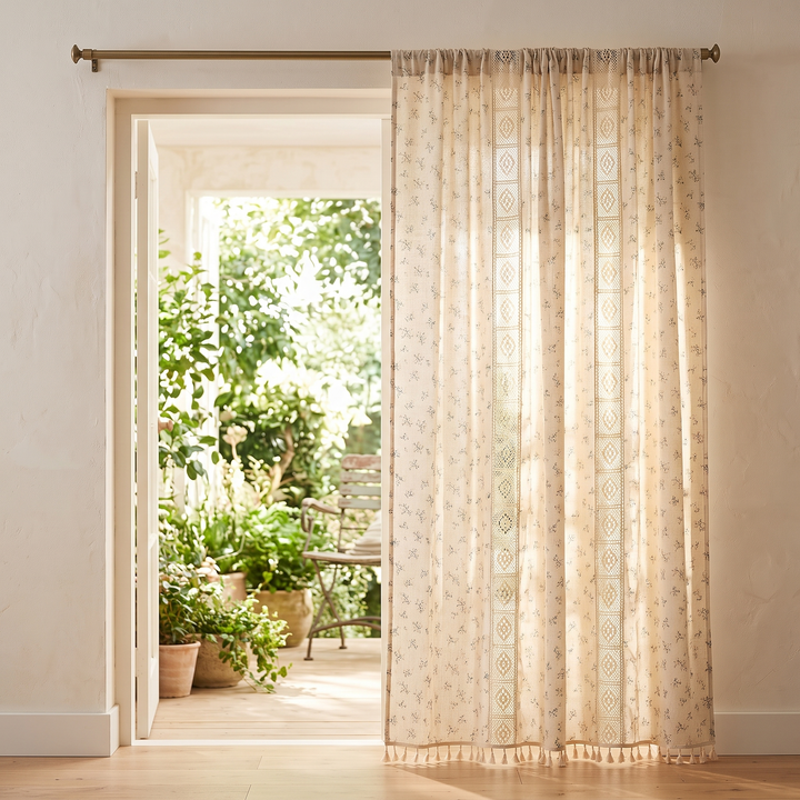 Floral Curtain Panel – Rod Pocket in Cream Sprig – Crochet – single panel hung beside an open doorway to a sunlit garden