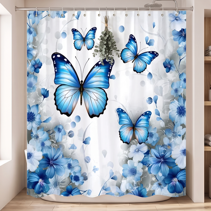 Floral Fabric Shower Curtain in White – Butterflies – eucalyptus bunch hanging in front of the curtain beside a showerhead