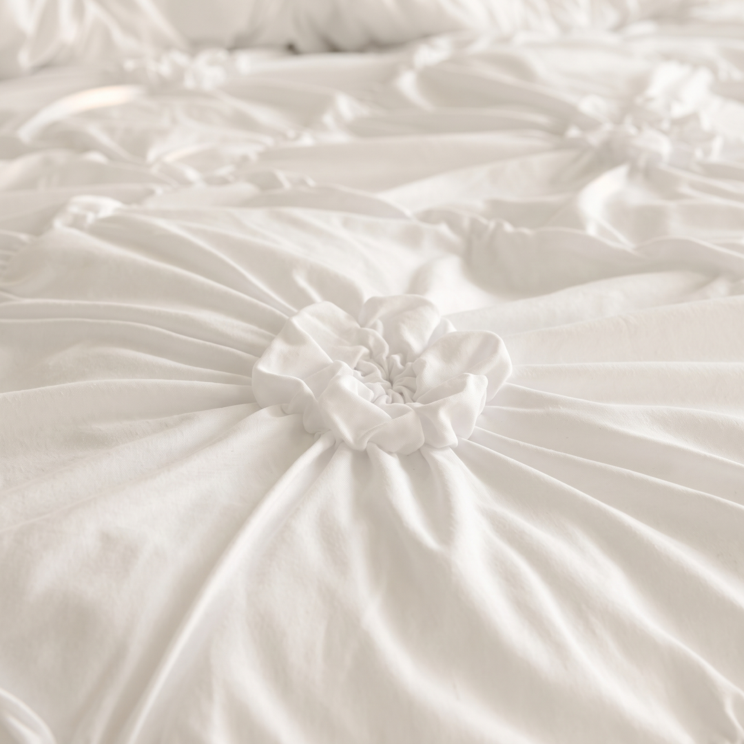 Flower Duvet Cover Set – Ruffled 3D Rosettes in White – close-up of a gathered rosette on the bed surface