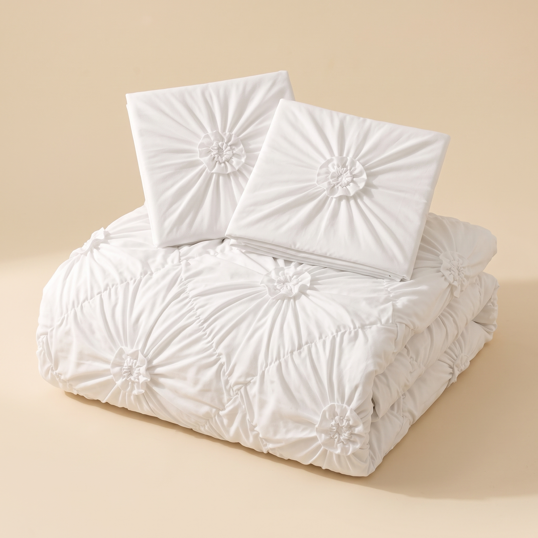 Flower Duvet Cover Set – Ruffled 3D Rosettes in White – folded stack with two matching pillow shams on top, beige backdrop