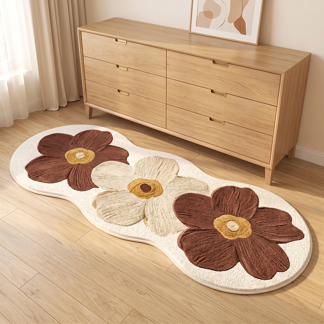 Flower Rug – Bedside Runner in Chestnut Brown – on a wood floor in front of a light oak dresser
