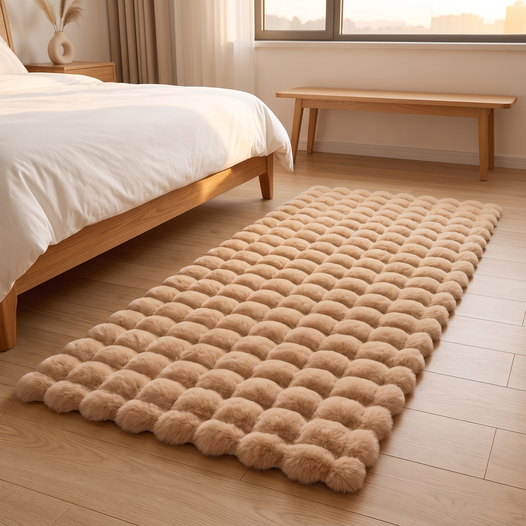 Fluffy Faux Fur Rug – Bubble Texture in Camel – laid flat on plank flooring with wooden bench behind