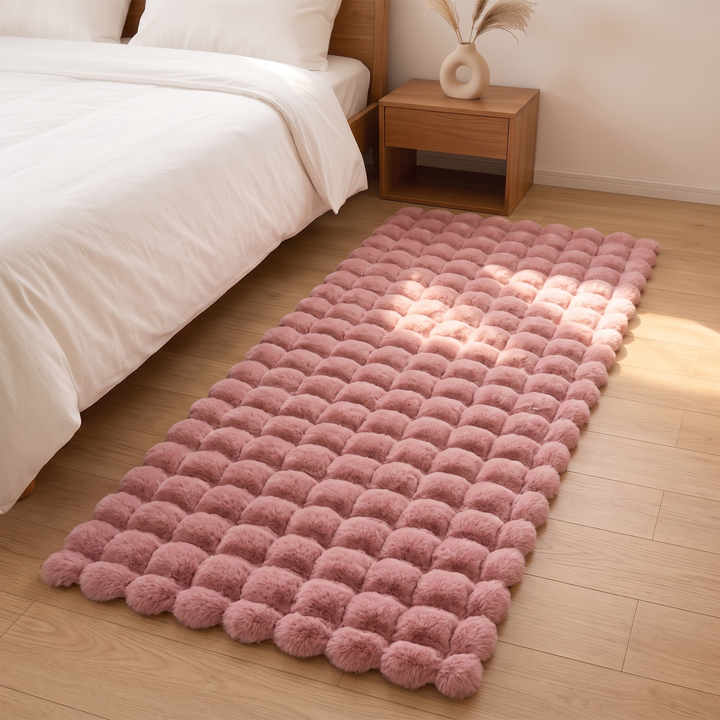Fluffy Faux Fur Rug – Bubble Texture in Rose – high angle view with sunlight streaming across the pile