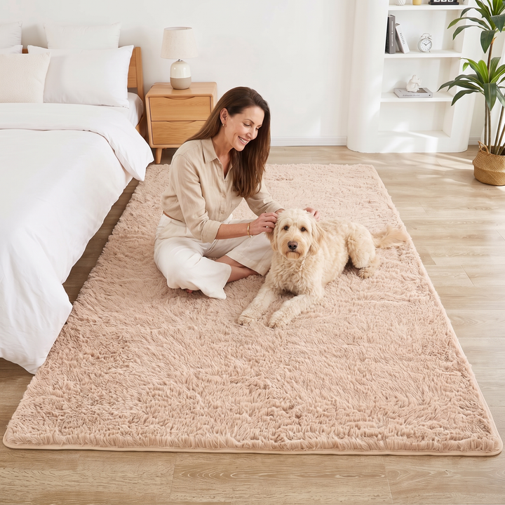 Fluffy Shag Rug in Beige – with a woman and her dog sitting together on it