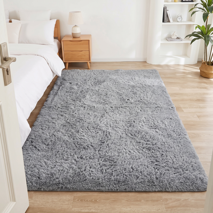 Fluffy Shag Rug in Gray – viewed from an open bedroom doorway past the door handle