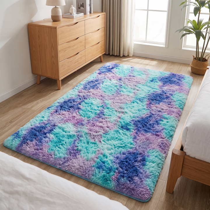 Fluffy Shag Rug in Teal &amp; Purple – Tie-Dye – angled between two beds toward a curtained window