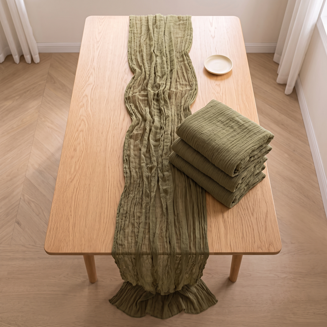 Gauze Table Runners – Set of 4 in Olive Green – overhead view of runner and folded stack beside small dish