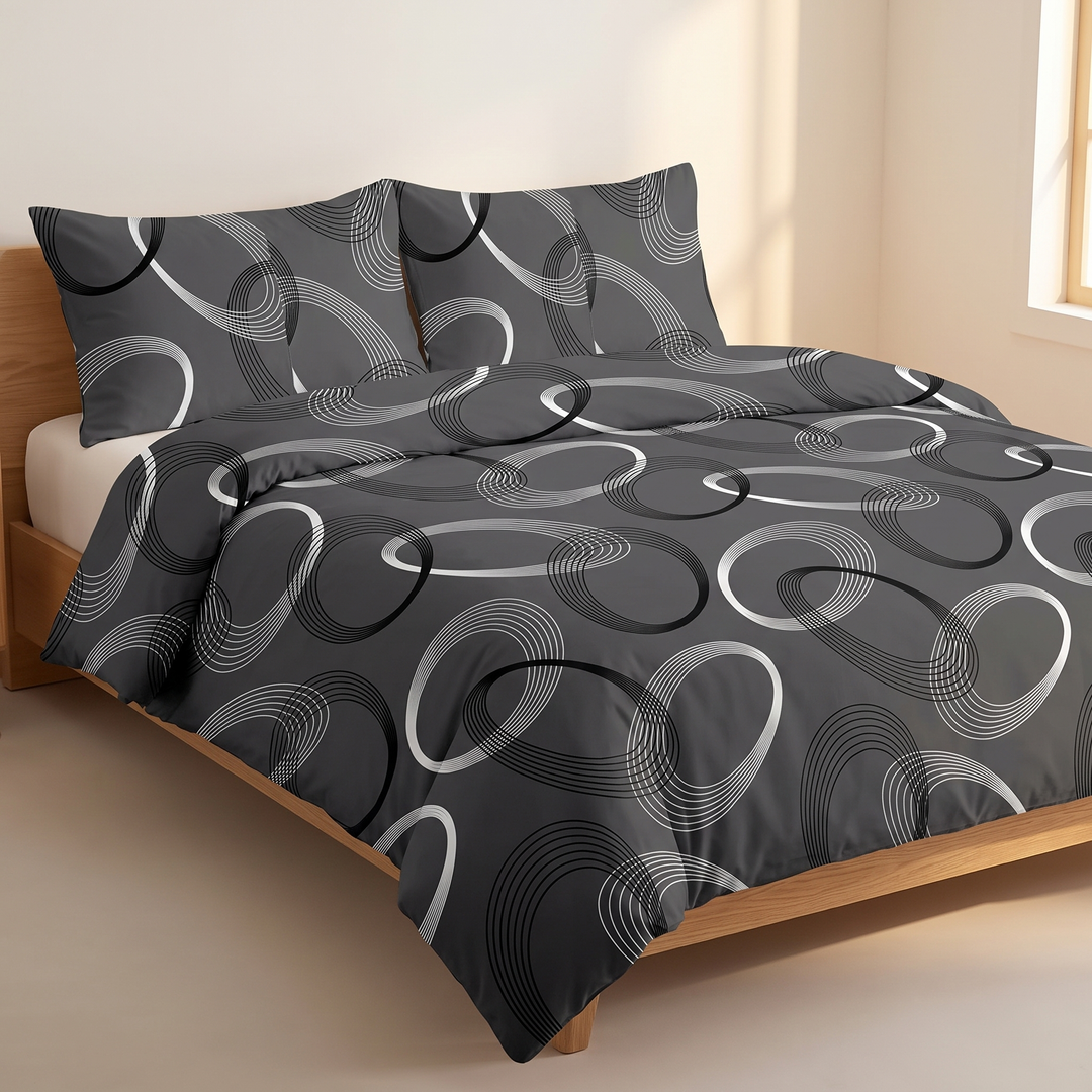 Geometric Duvet Cover Set in Dark Gray Geometric – on a made bed with two pillows in a bright bedroom