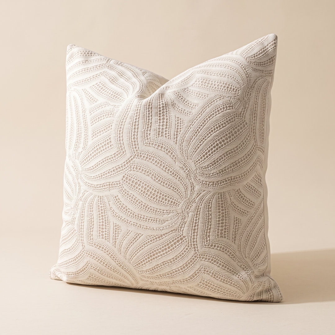 Geometric Throw Pillow Cover – Jacquard in Cream – Wave – standing at an angle on a plain beige studio background with soft shadow