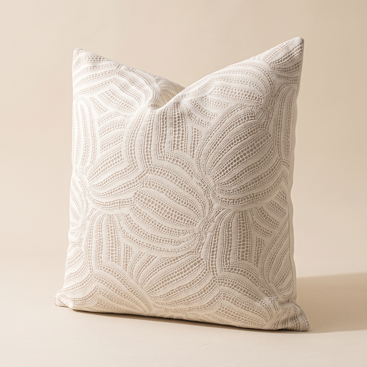 Geometric Throw Pillow Cover – Jacquard in Cream – Wave – standing at an angle on a plain beige studio background with soft shadow